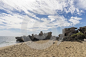 Windswept rocks on Penguin Island against a dramatic sky, Rockingham, Western Australia