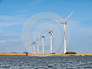 Windturbines of wind park on coast of Ketelmeer, Flevoland, Netherlands
