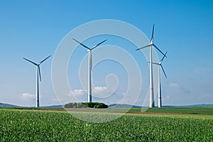 Windwheels under a blue sky