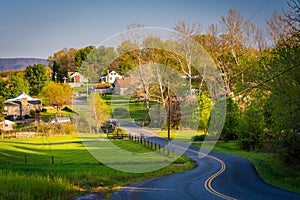 Windy country road and view of farms and houses in the Shenandoah Valley of Virginia.