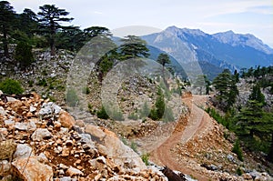 Windy dirt road in the mountains in Turkey