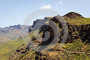 Windy road alongside slope of Degollada de las Yeguas canyon in Gran Canaria