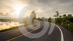 Windy road and sunrise photo