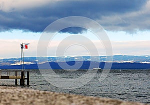 Windy weather on Geneva Lake. Evian, France, winter 2019