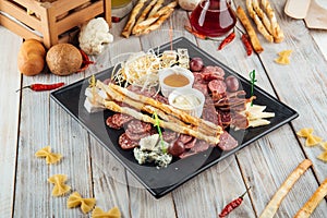 Wine appetizer set smoked sausages cheese honey