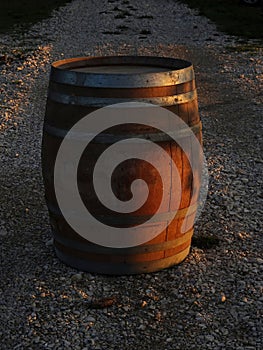 Wine barrel in the alley, wooden cask outside