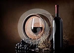 Wine with barrel and hay