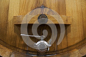 Wine barrel with metal tap