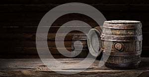 Wine barrel on the old wooden table