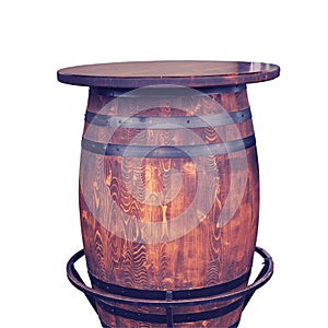 A wine barrel in the shape of a table in a cafe, isolated on a white background