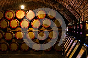 Wine barrels in the antique cellar. Cavernous wine