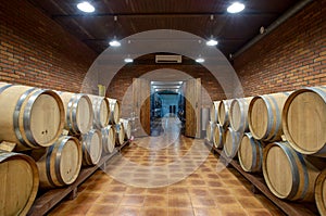 Wine barrels in the basement of the winery