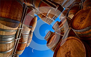 Wine barrels with blue skies and half moon