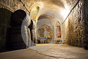 Wine barrels in cellar. Wine storage place