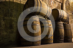 Wine barrels in cellar. Wine storage place