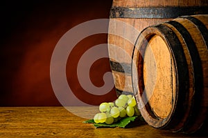 Wine barrels and grapes