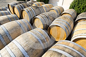 Wine barrels stacked in cellar