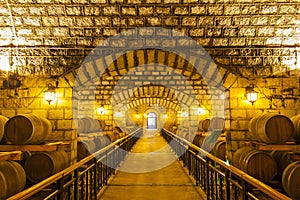 Wine barrels stacked in the cellar