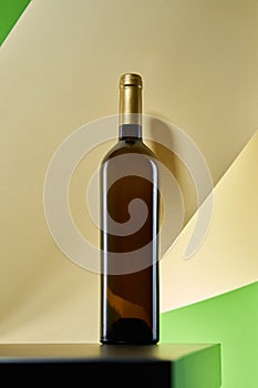 Wine bottle on artistic paper background