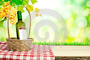 Wine bottle with basket in nature