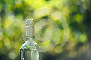 Wine bottle with blur background in vineyard, Hungary