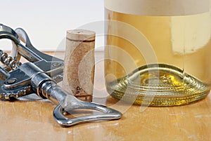 Wine bottle with cork and corkscrew