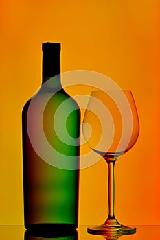 Wine bottle and glass