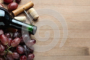 Wine bottle and grapes