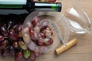 Wine bottle and grapes