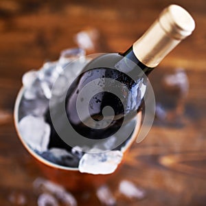 Wine bottle in ice bucket