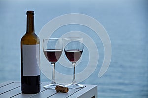 Wine bottle with two glasses