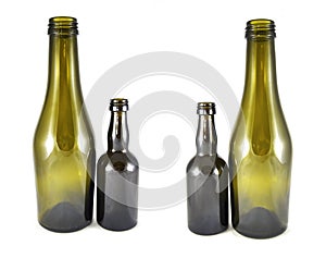 Wine bottle on a white background close-up. Glass, vessel, neck, wallpaper, background, texture, alcoholism