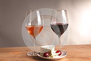 Wine bottle and wine glass on a glass table