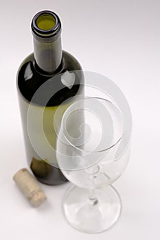 Wine bottle and wineglass photo