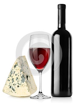 Wine bottle, wineglass and cheese