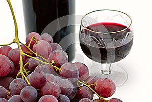 Wine bottle and wineglass with grape isolated