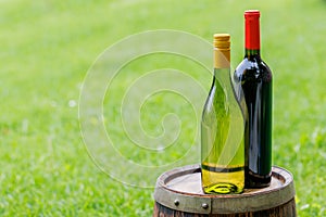 Wine bottles on barrel