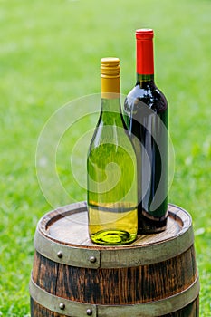 Wine bottles on barrel