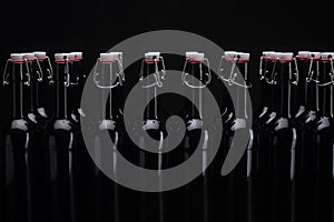 Wine bottles on black background. Isolated black background.