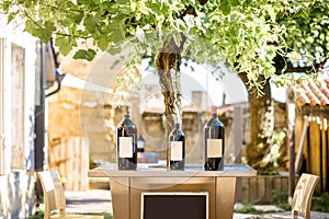 Wine bottles with blank label on the table