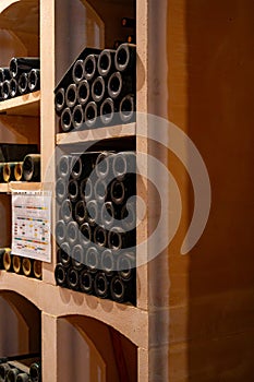 Wine bottles depository in underground cellar, Saint-Emilion wine making region picking, cru class Merlot or Cabernet Sauvignon