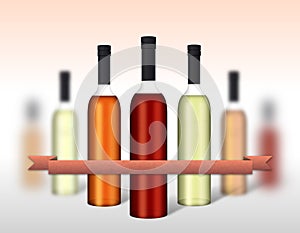 Wine bottles grouped with ribbon