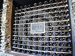 Wine bottles maturing vintage 1999 winemaking