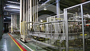 Wine bottles moving along a conveyor belt