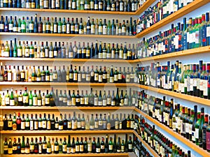 Wine bottles on shelves