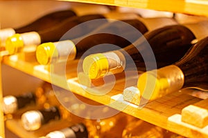 Wine bottles storage on wine rack in restaurant