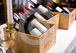 Wine bottles in wooden boxes.