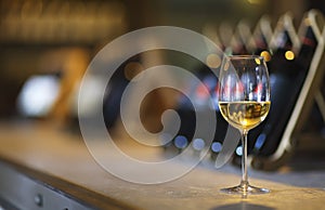 Wine bottles on a wooden shelf. Wine bar.