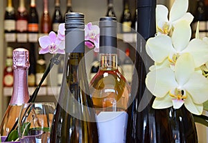 Wine bottles on wooden shelf in wine store, View from the top