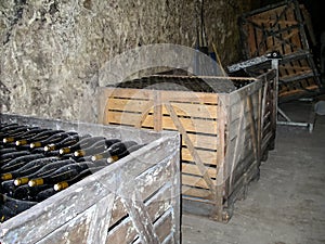 Wine cellar with bottles of wine from a French winemaker